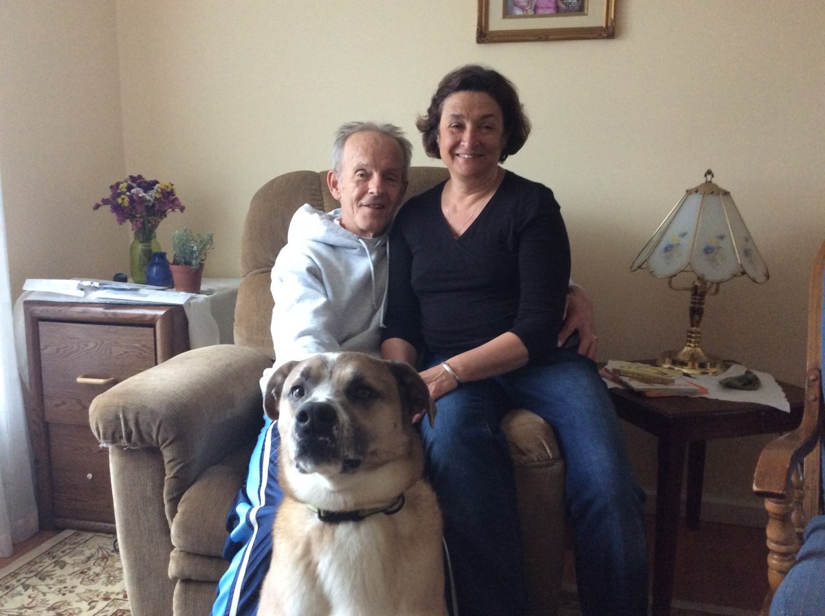 Fred and Linda Knewstub enjoy time with their rescue dog, Buddy.